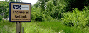 AMG Engineered Wetlands landscape and sign